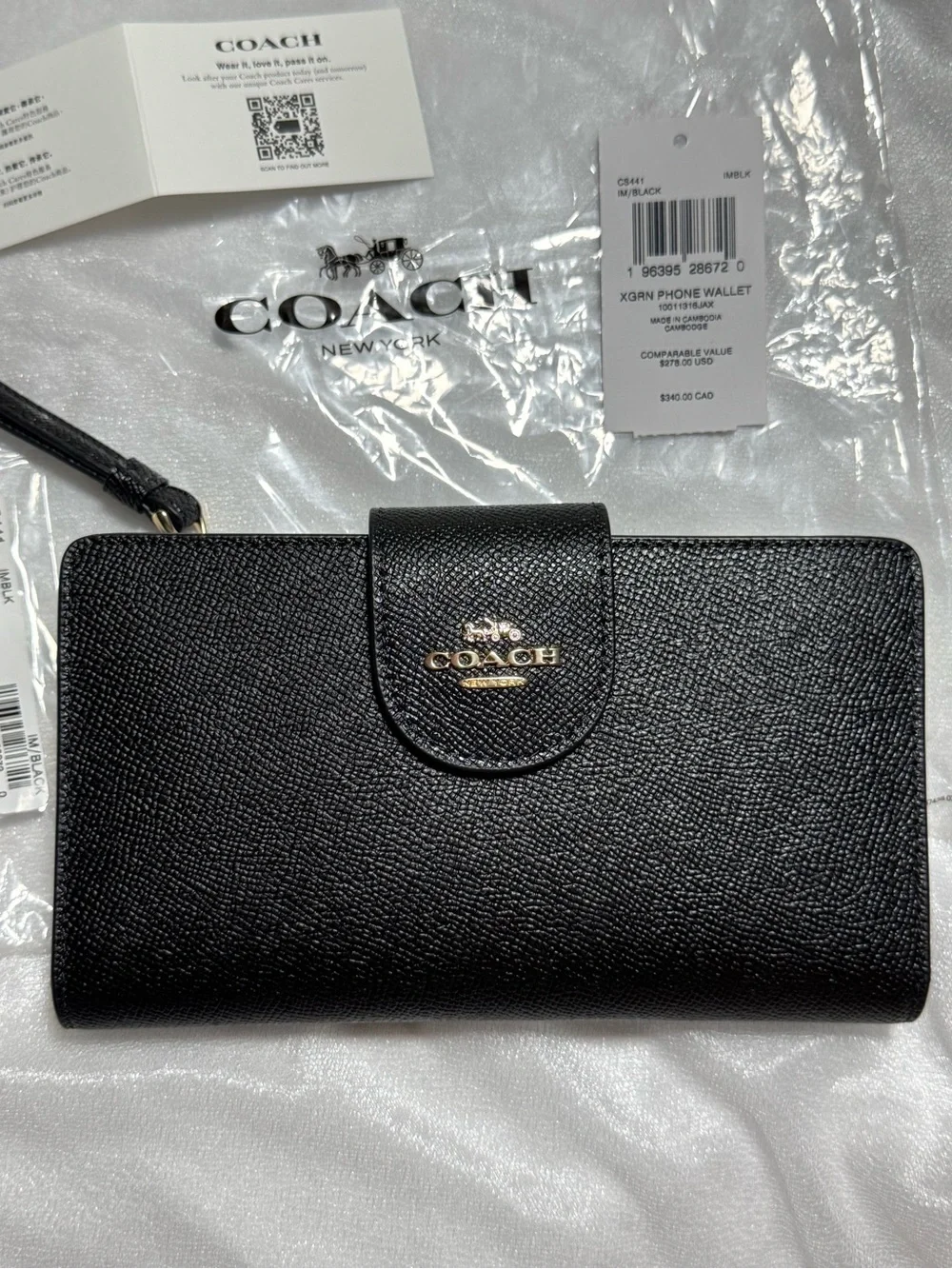 COACH Black Pebbled Leather Phone Wallet with wrist strap, zipped coins pocket